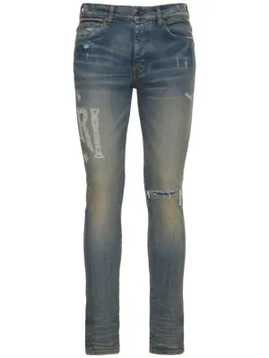 Amiri   Amiri logo distressed jeans 