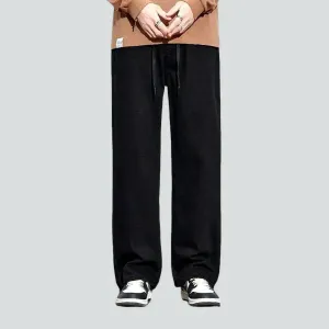 High-waist men's monochrome jeans