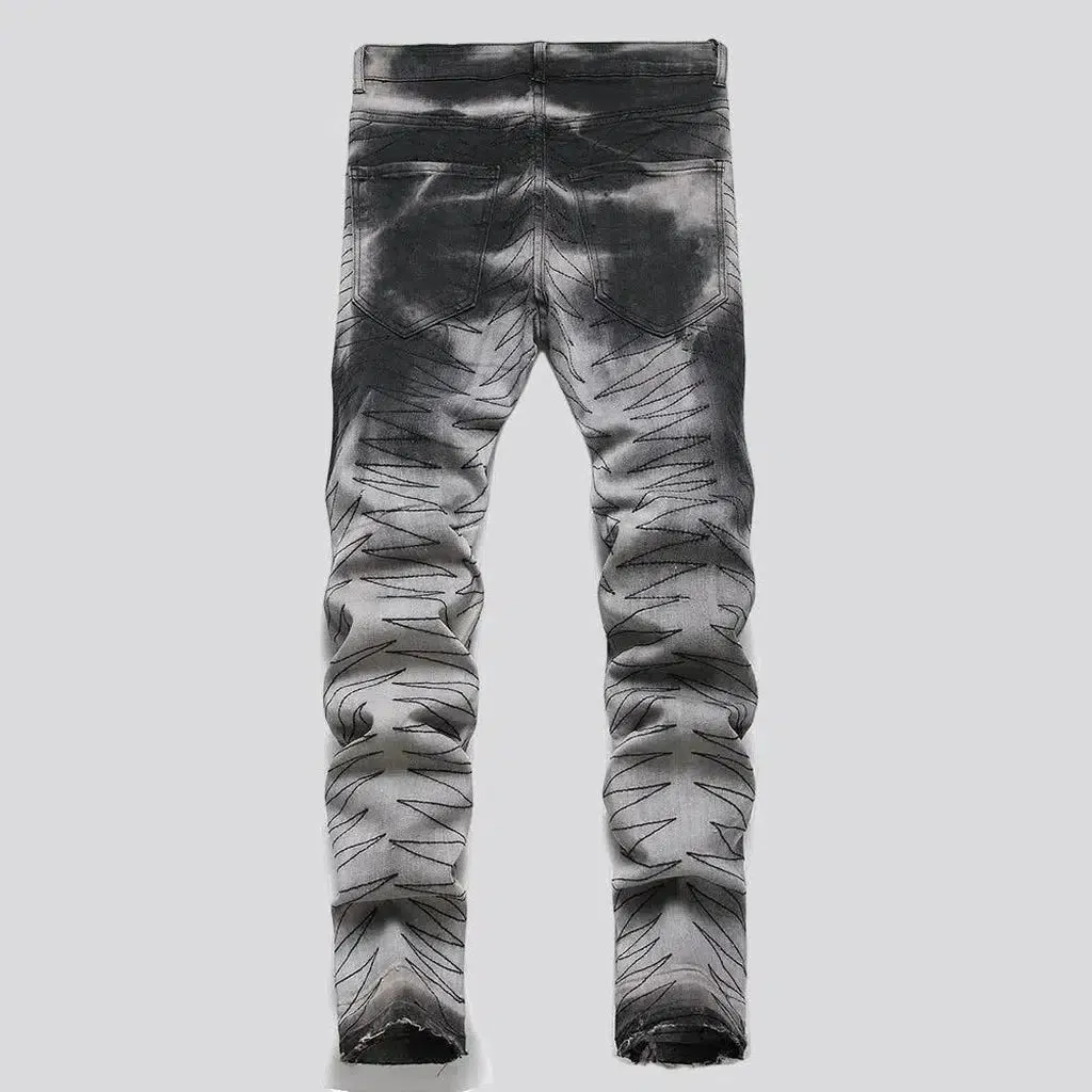 Raw-hem men's patched jeans