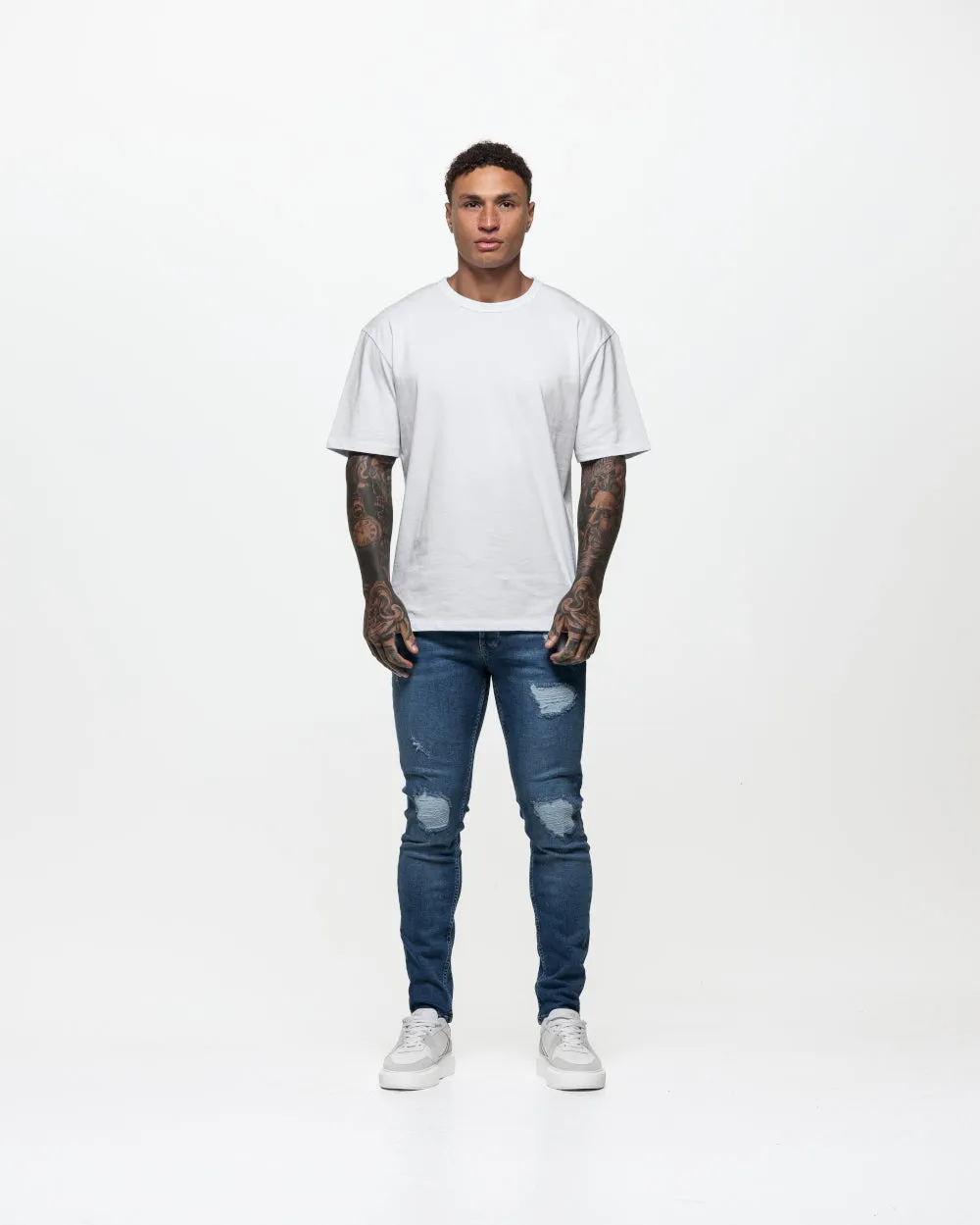 Ripped & Repaired Skinny Jeans - Blue Wash