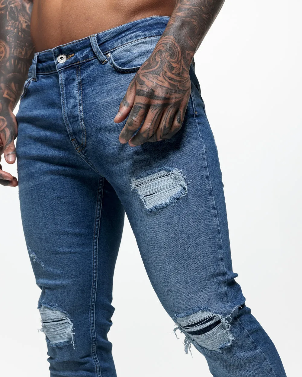 Ripped & Repaired Skinny Jeans - Blue Wash