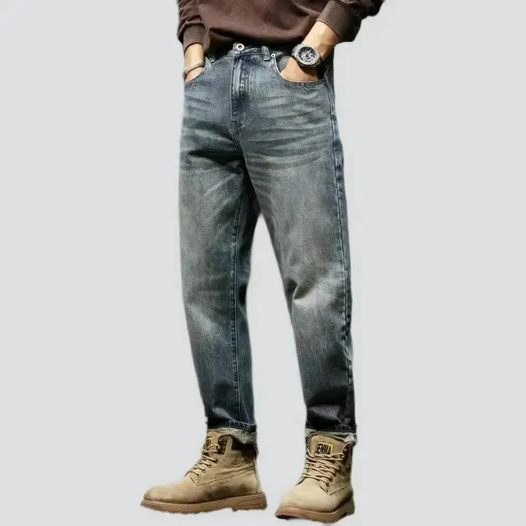 Whiskered men's loose jeans