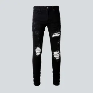 White patch ripped biker jeans